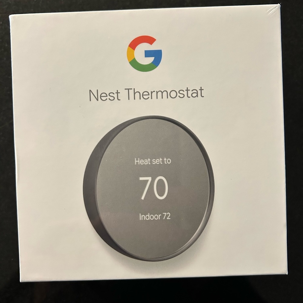 Google Nest thermostat. Charcoal. New, sealed.